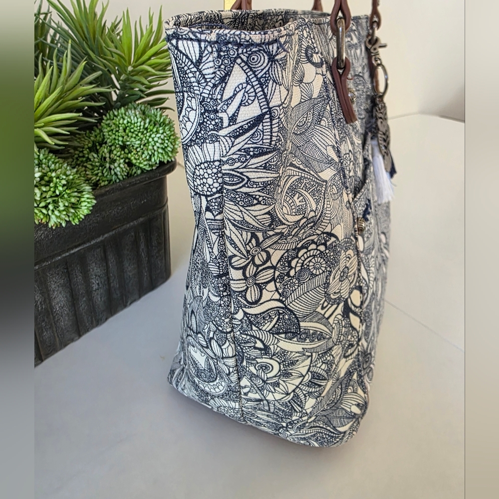 Sakroots Navy Floral Canvas Tote with Tassel Charm - Picture 10 of 16